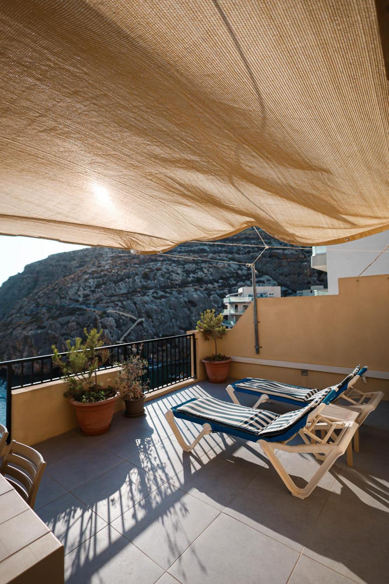 Seafront Duplex Penthouse With Terrace Overlooking Xlendi Bay Extérieur photo